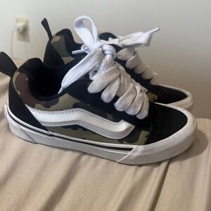 Vans Camouflage and Black Sneakers